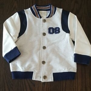 Fitst Impressions Stylish White and Navy Baby Varsity Jacket. Size 18mth